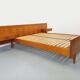 Double bed vintage Scandinavian in teak from the 1960s with integrated bedside tables.