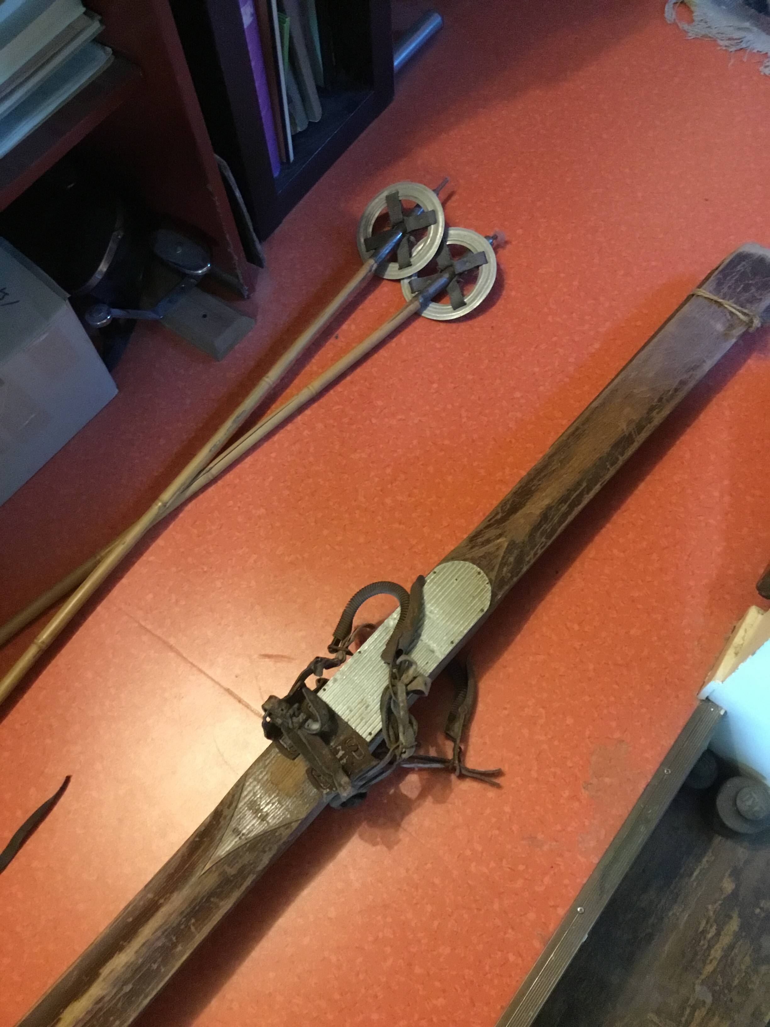 Pair of old skis and poles