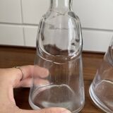 Pair of decanters by Erik Hoglund for Neiman Marcus, "People" series, Kosta Boda