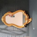 Miroir doré style louis xv.