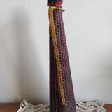 Red and black scoubidou bottle