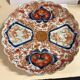 Plat rond en porcelaine Imari