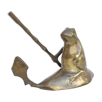 Frog that catches a brass fish