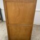 Double-column oak filing cabinet with curtains, 50.