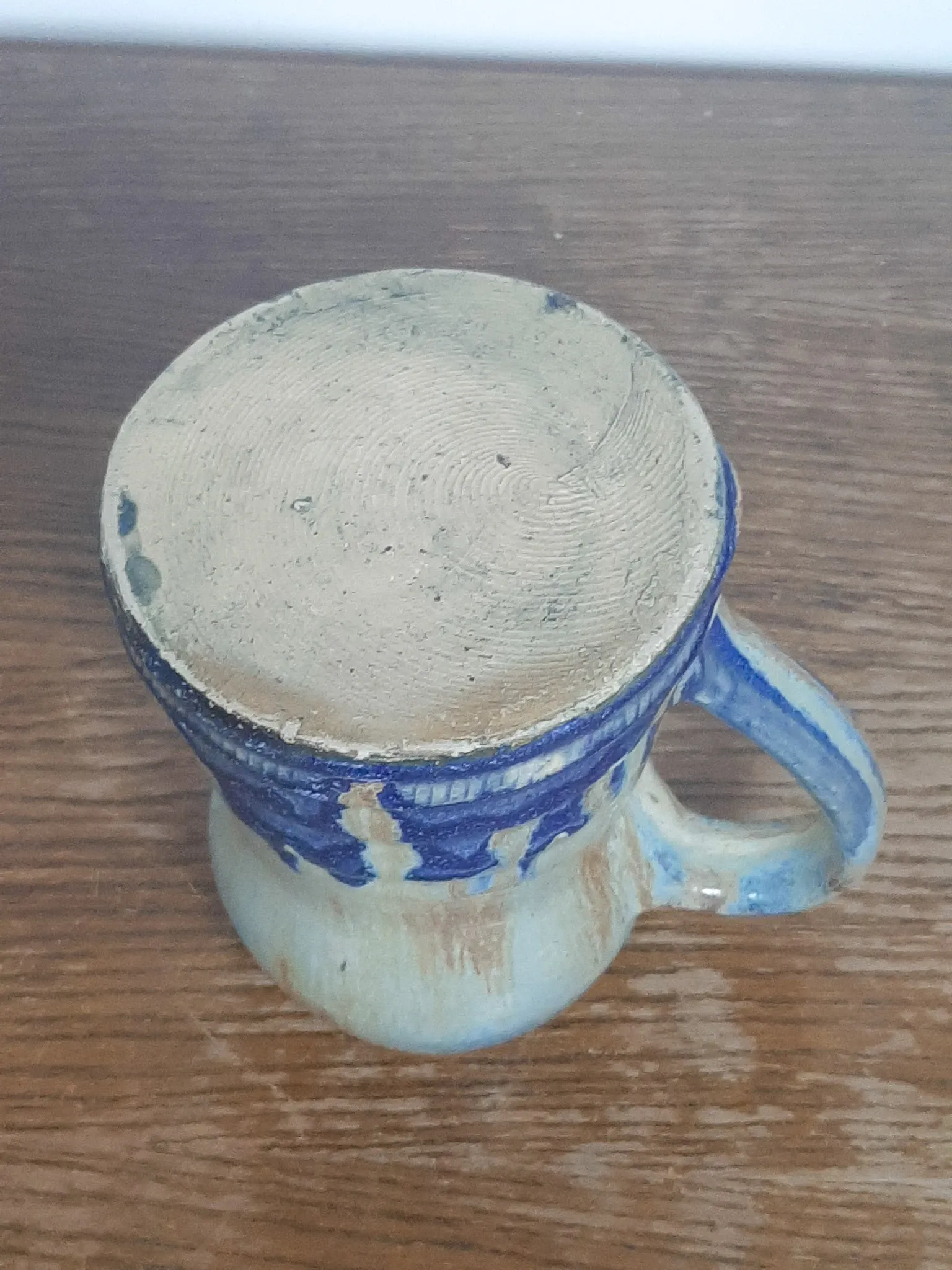 Blue flamed stoneware jug