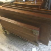 Coffee table with storage for bottles and glasses in oak.