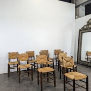 Set of 10 Bauche model chairs by Charlotte Perriand, circa 1960.