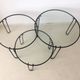 Set of three coffee tables black glass in the middle of the century with legs and metal hairpin