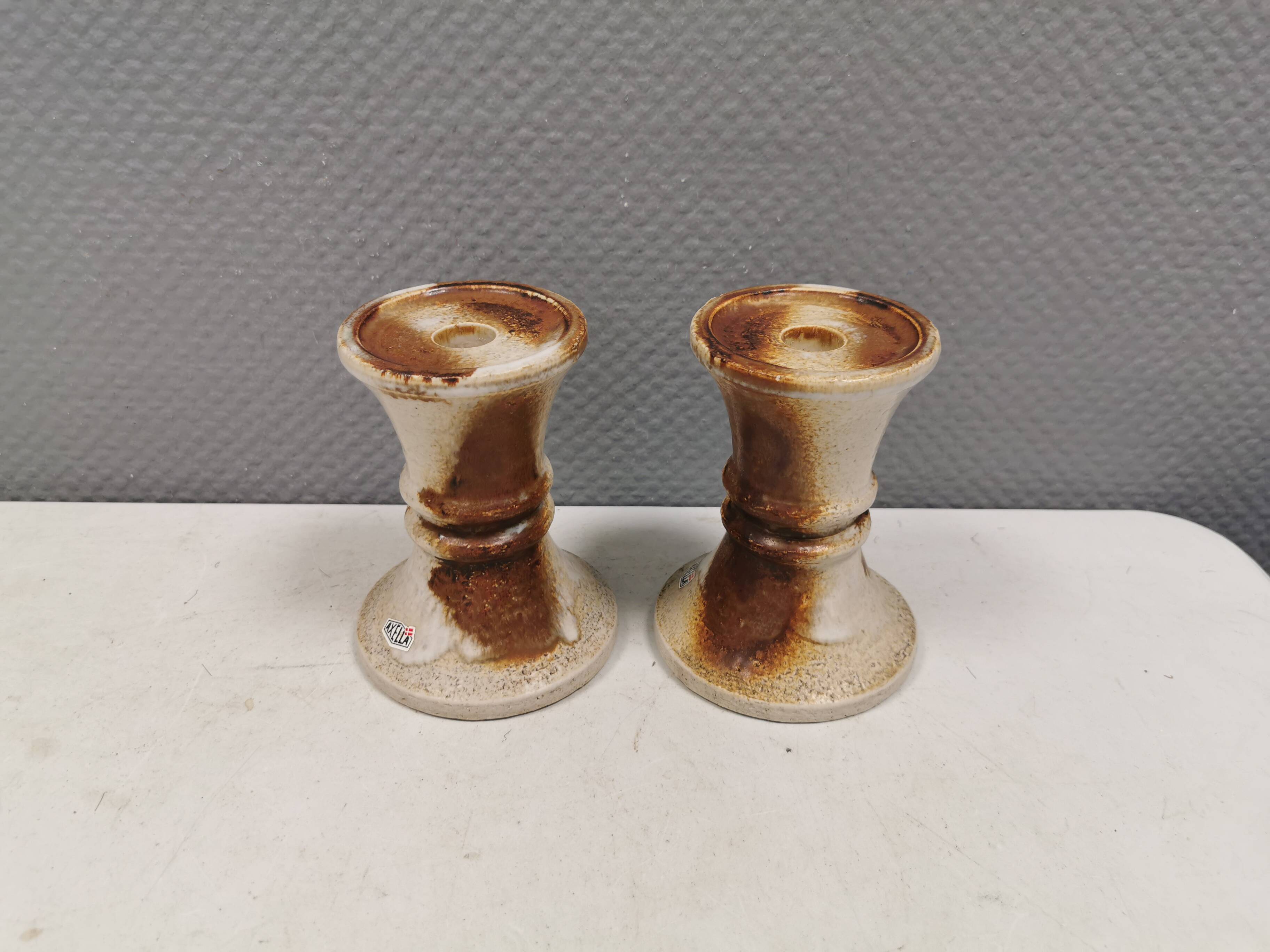 A set of ceramic candleholders by Axel Larsen for his own company, Axella