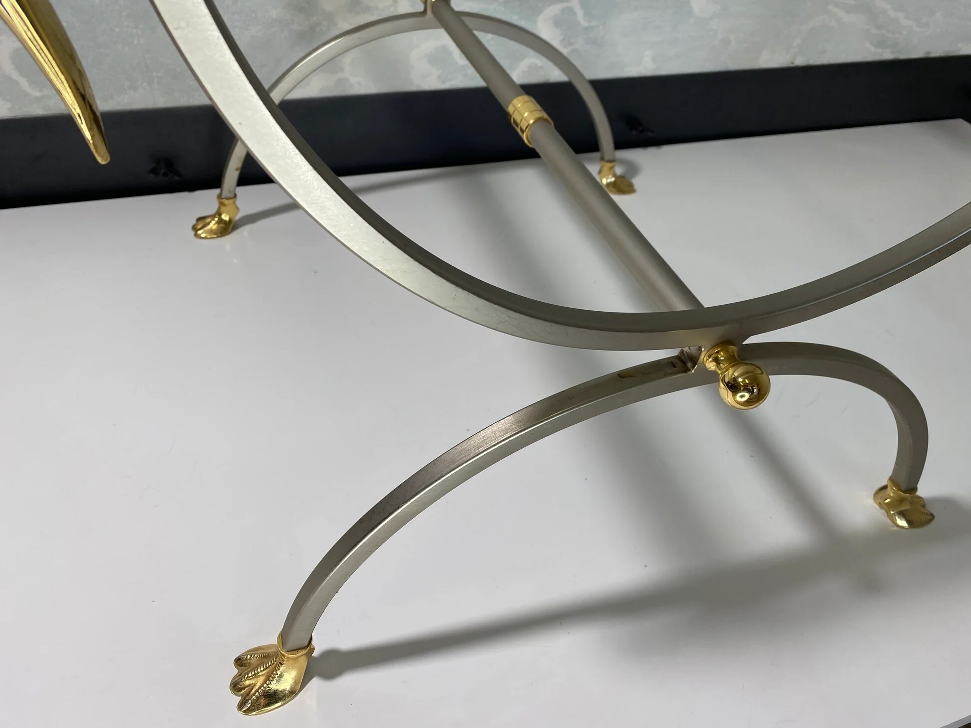 Neoclassical curule side tables by Maison Jansen, France, 1970s.