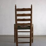 Rustic ladder-back oak chairs with embroidered seats | Netherlands | 1950s