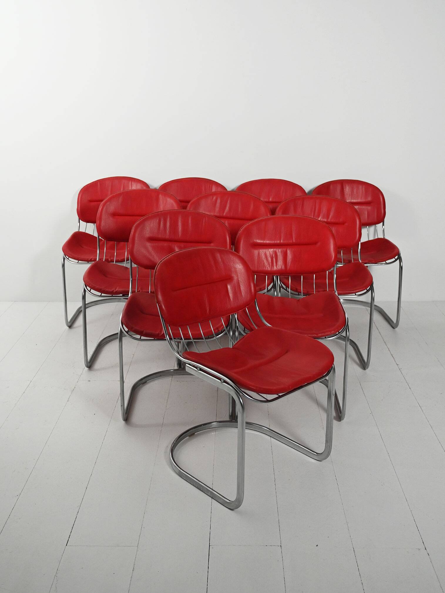 Ten 1970s chairs attributed to Gastone Rinaldi
