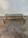 Gold metal coffee table with elm burl imitation.
