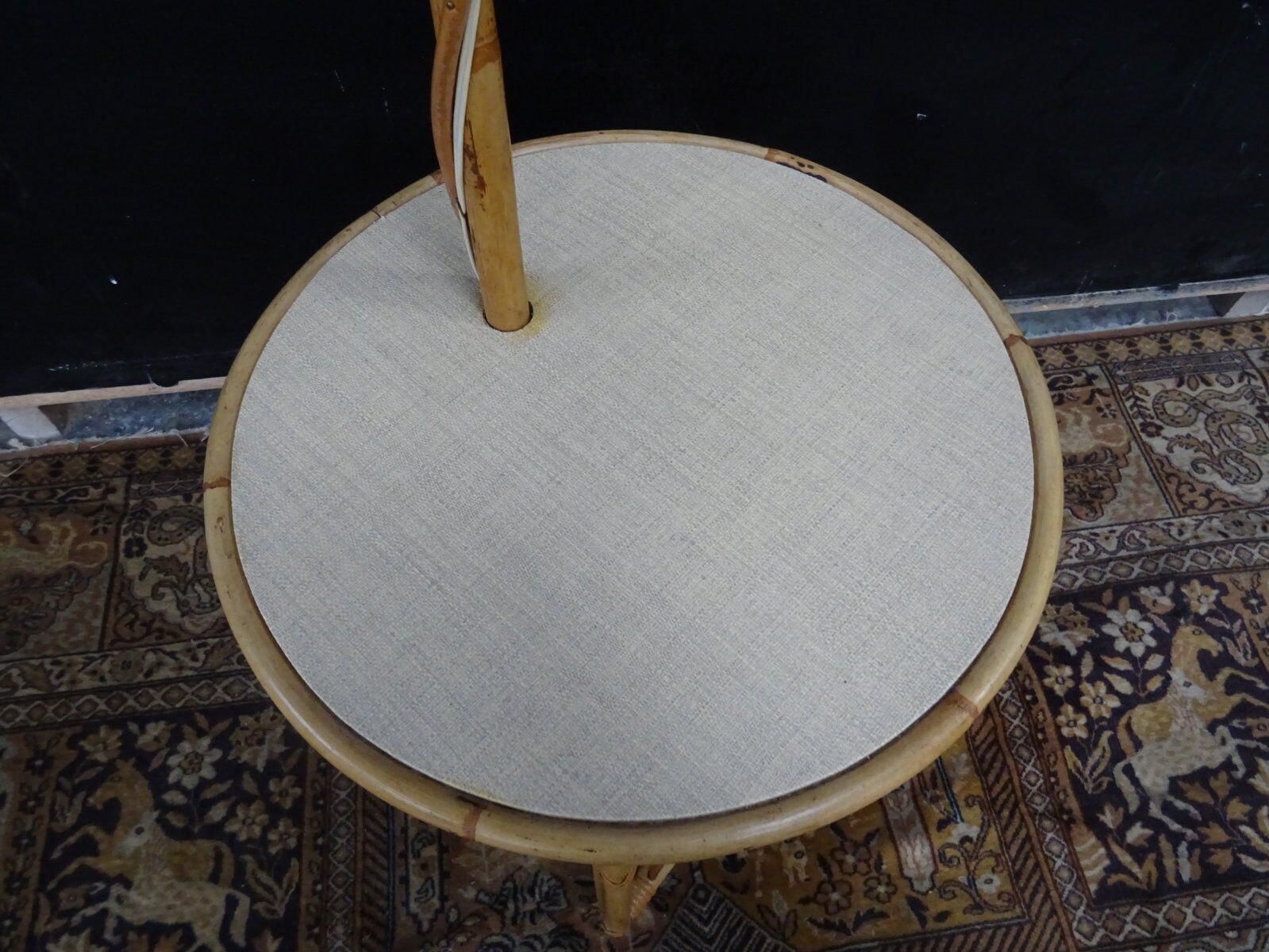 Lamppost wears rattan magazines