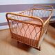 Vintage baby bed in wicker/rotin