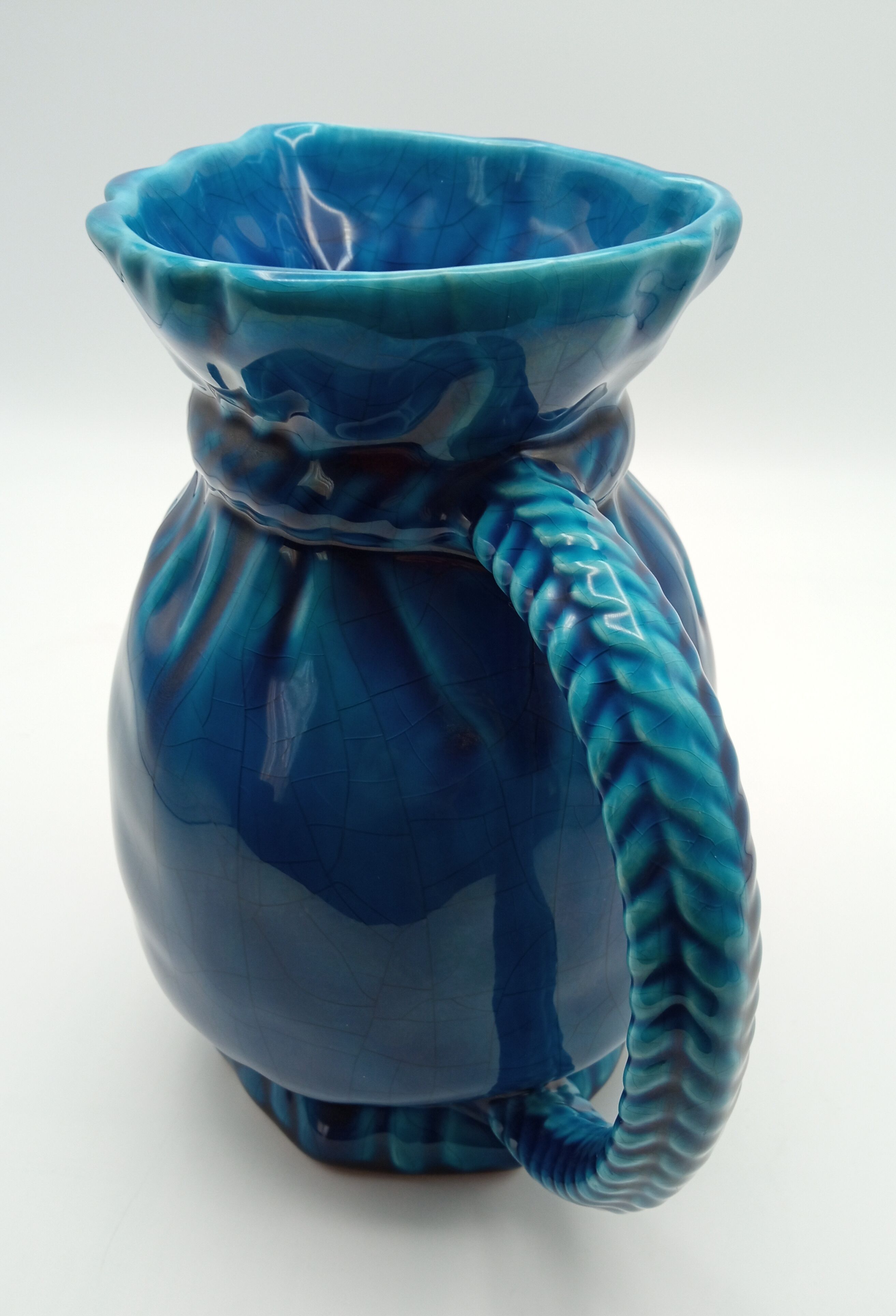 Pitcher in cracked blue Charolles earthenware