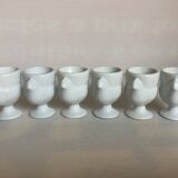Six white hen egg cups