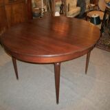 Oval mahogany table with extension cords
