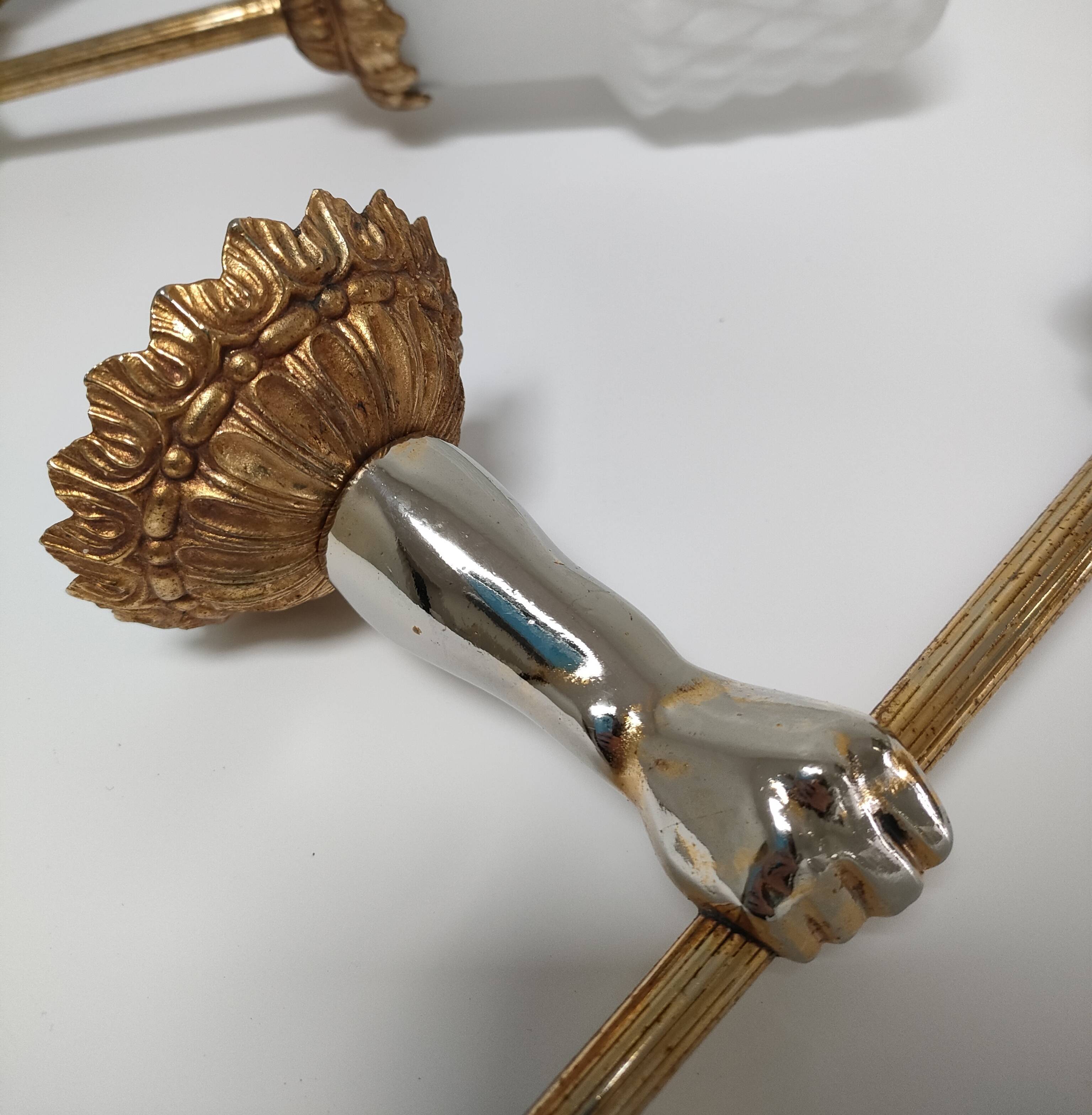 Pair of vintage patinated golden metal hand sconces