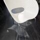 4 Tom Vac chairs designed by Ron Arad with a white round table of 110cm.