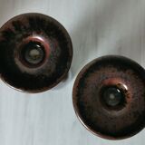 Pair of enamelled ceramic candlesticks
