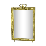 Miroir biseauté en bronze doré de style Louis XVI  37cm x 23,5cm