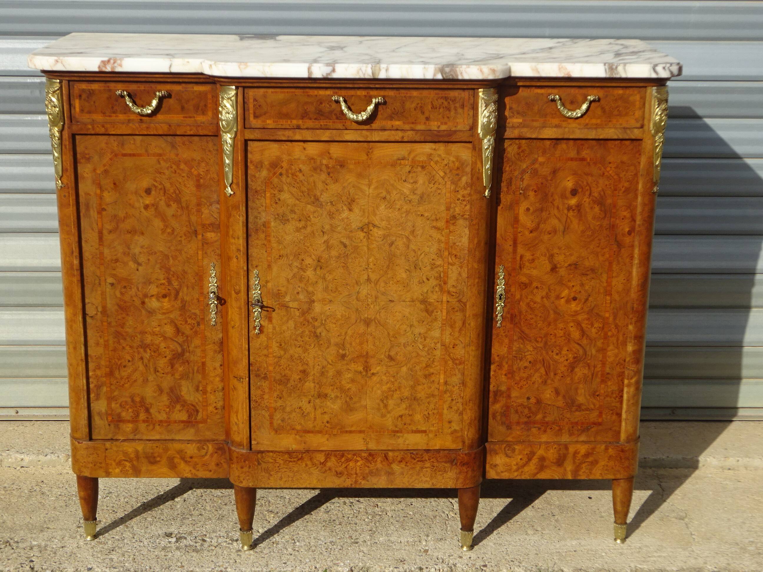 Louis XVI buffet with mirror, marble, and bronze fittings.
