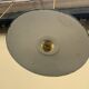 Vintage industrial enameled sheet metal pendant lights with golden wires, old green and white lampshade