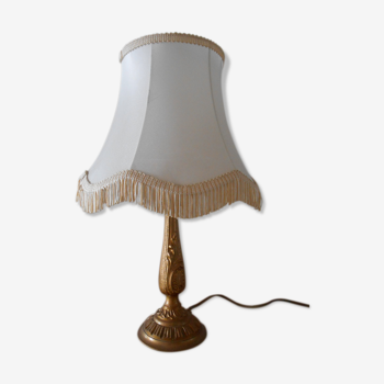 Lamp with brass foot and fringed lampshade