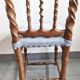 Chaise vintage en bois sculpté