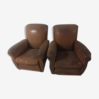 Paire de fauteuils club cuir vintage