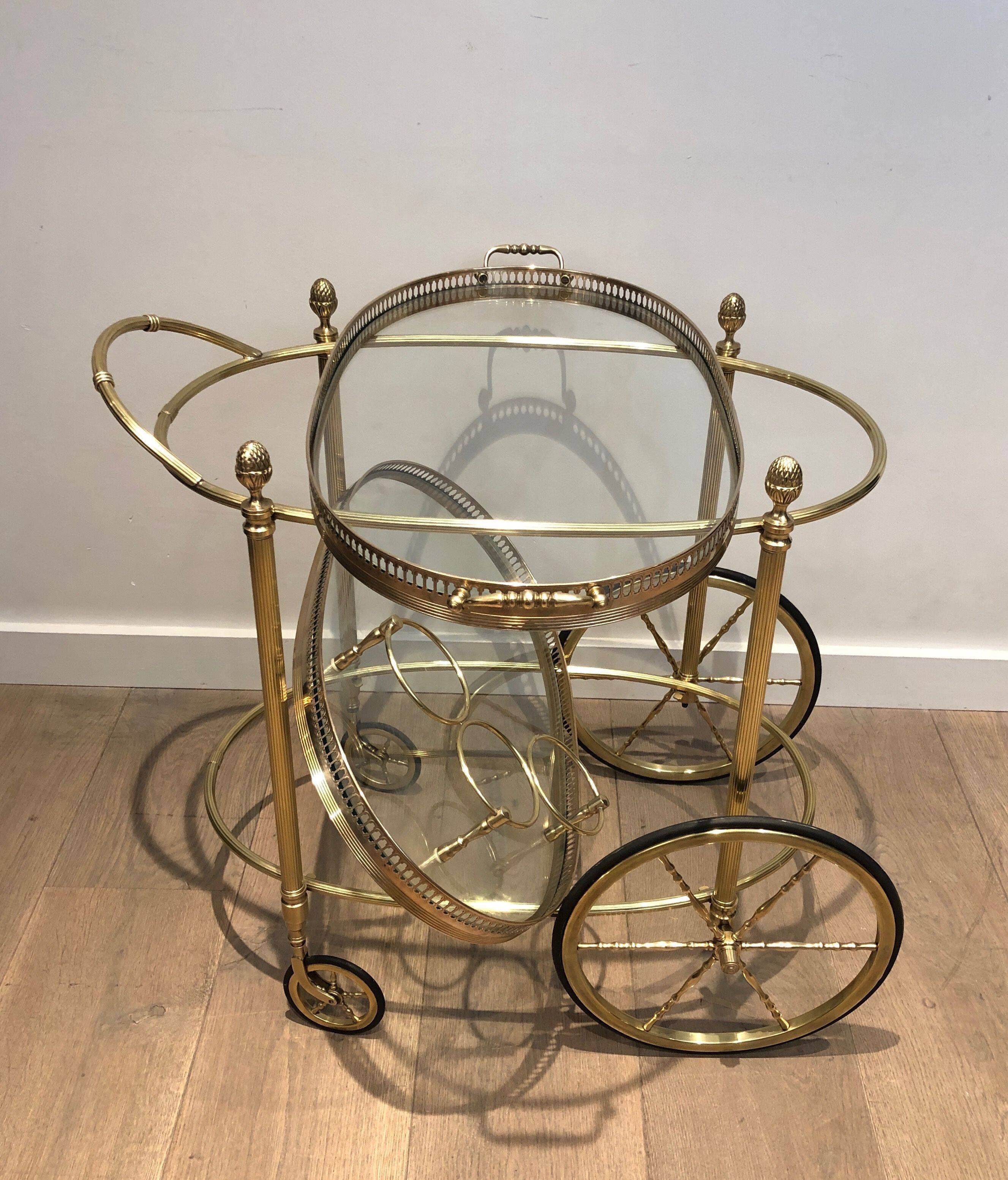 Oval brass trolley from Maison Baguès.