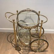 Oval brass trolley from Maison Baguès.