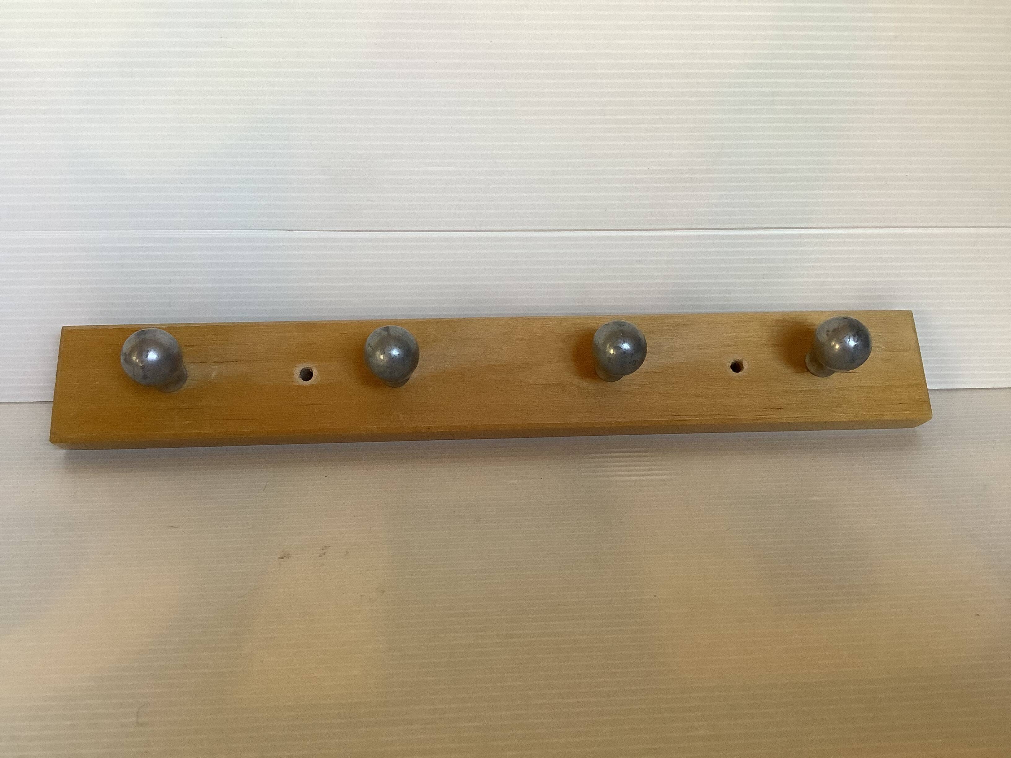 Wooden metal ball tea towel holder