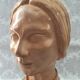 Bust in raw earth of atelier bust face of woman signed j.c.g.