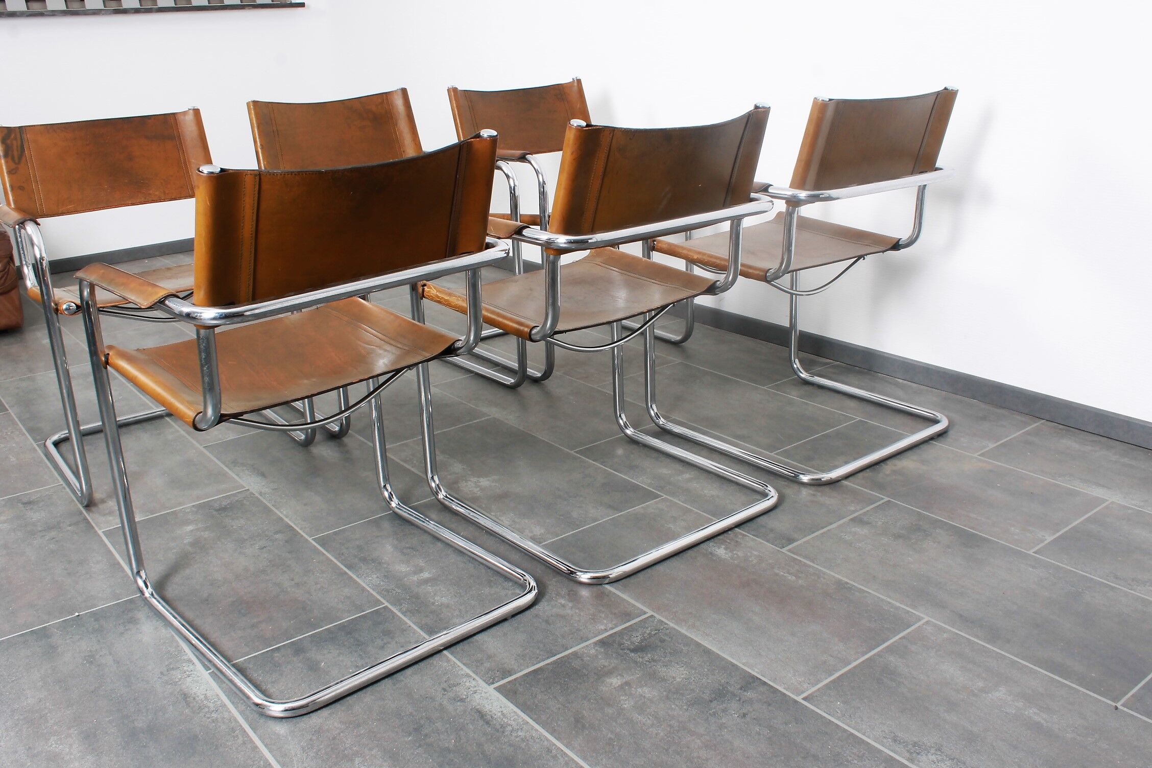 Set of six brown leather cantilever chairs Mart Stam