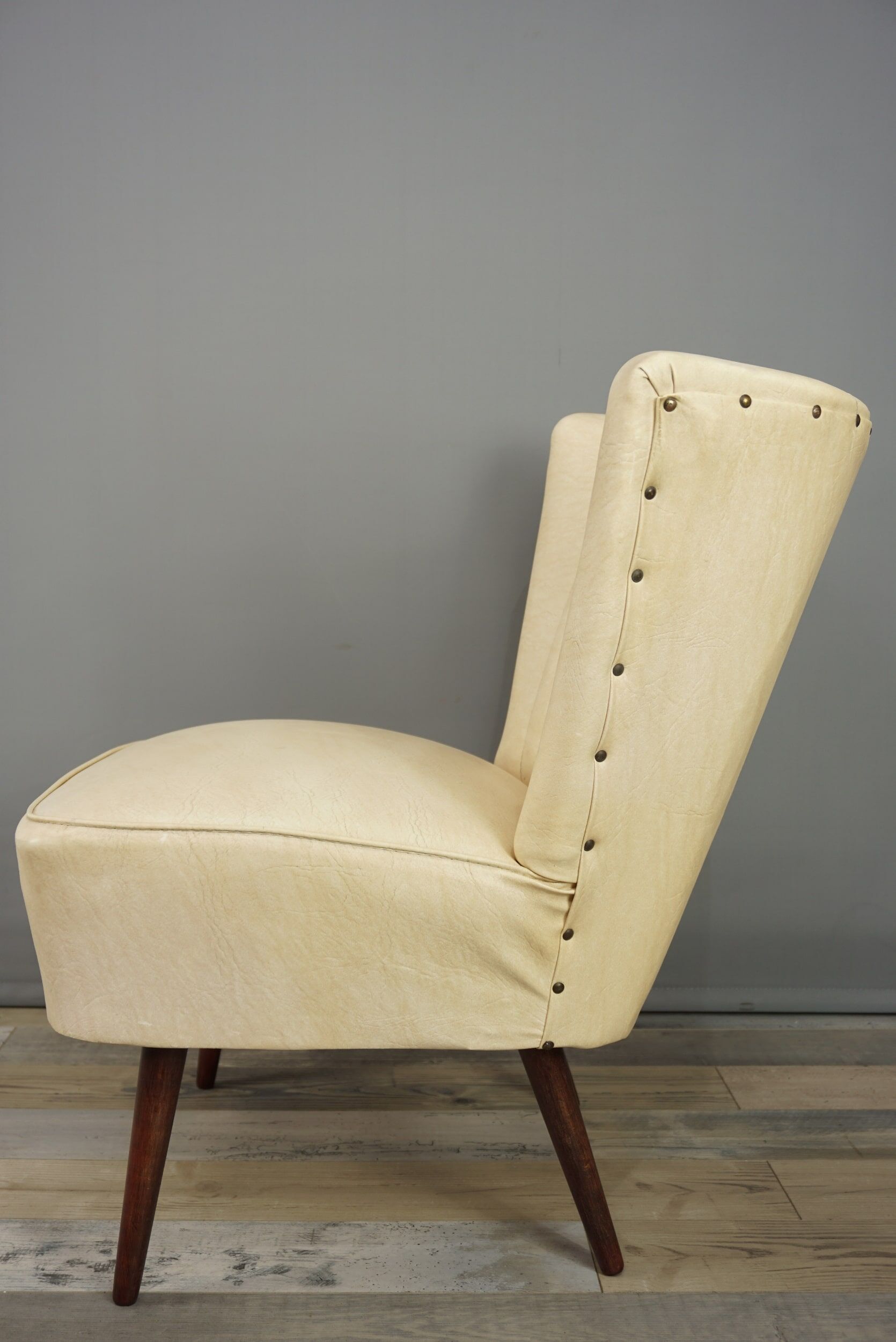 Cocktail armchair 50s in wood and imitation leather