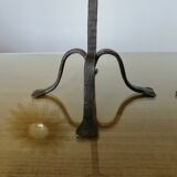 Pair of antique wrought iron candlesticks