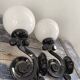 Pair of vintage enameled cast iron wall sconces