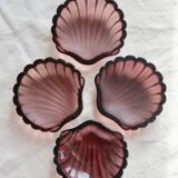 Vintage shell-shaped glass bowl in purple.