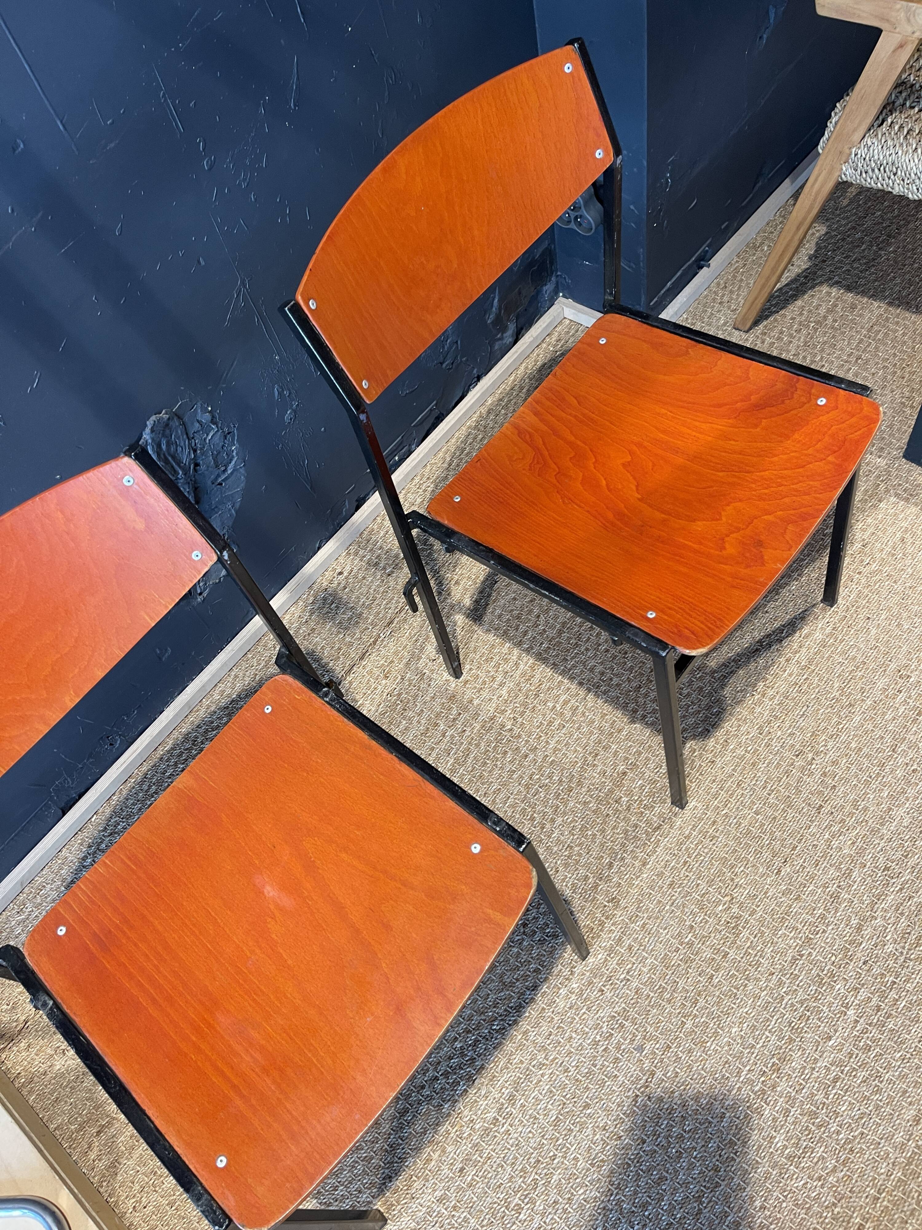 Pair of Gijs Van Der Sluis chairs in orange wood with black legs, Netherlands