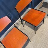 Pair of Gijs Van Der Sluis chairs in orange wood with black legs, Netherlands
