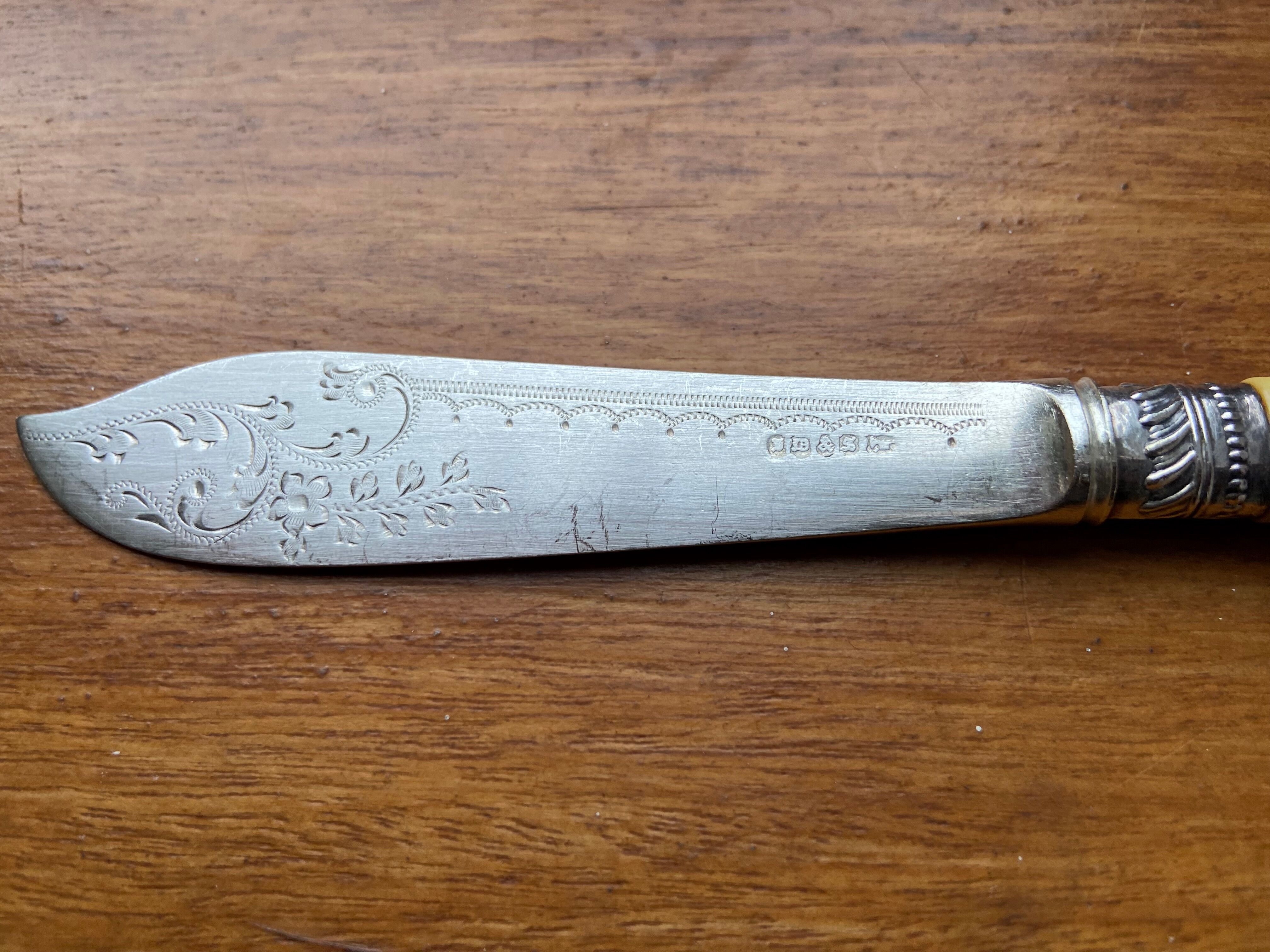 Antique silver-plated butter knife