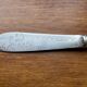 Antique silver-plated butter knife