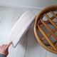 Pouf en rotin et tissu bouclette