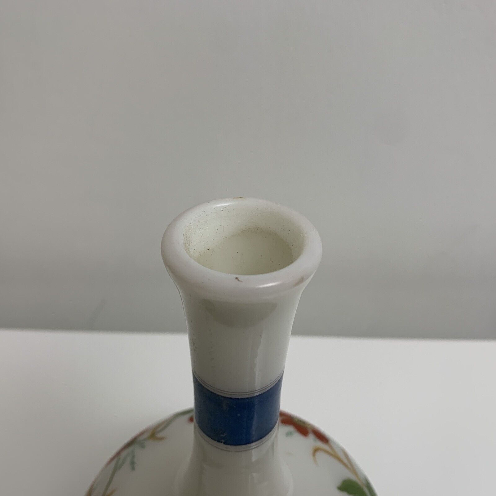 Old vase in opaline floral decoration painted