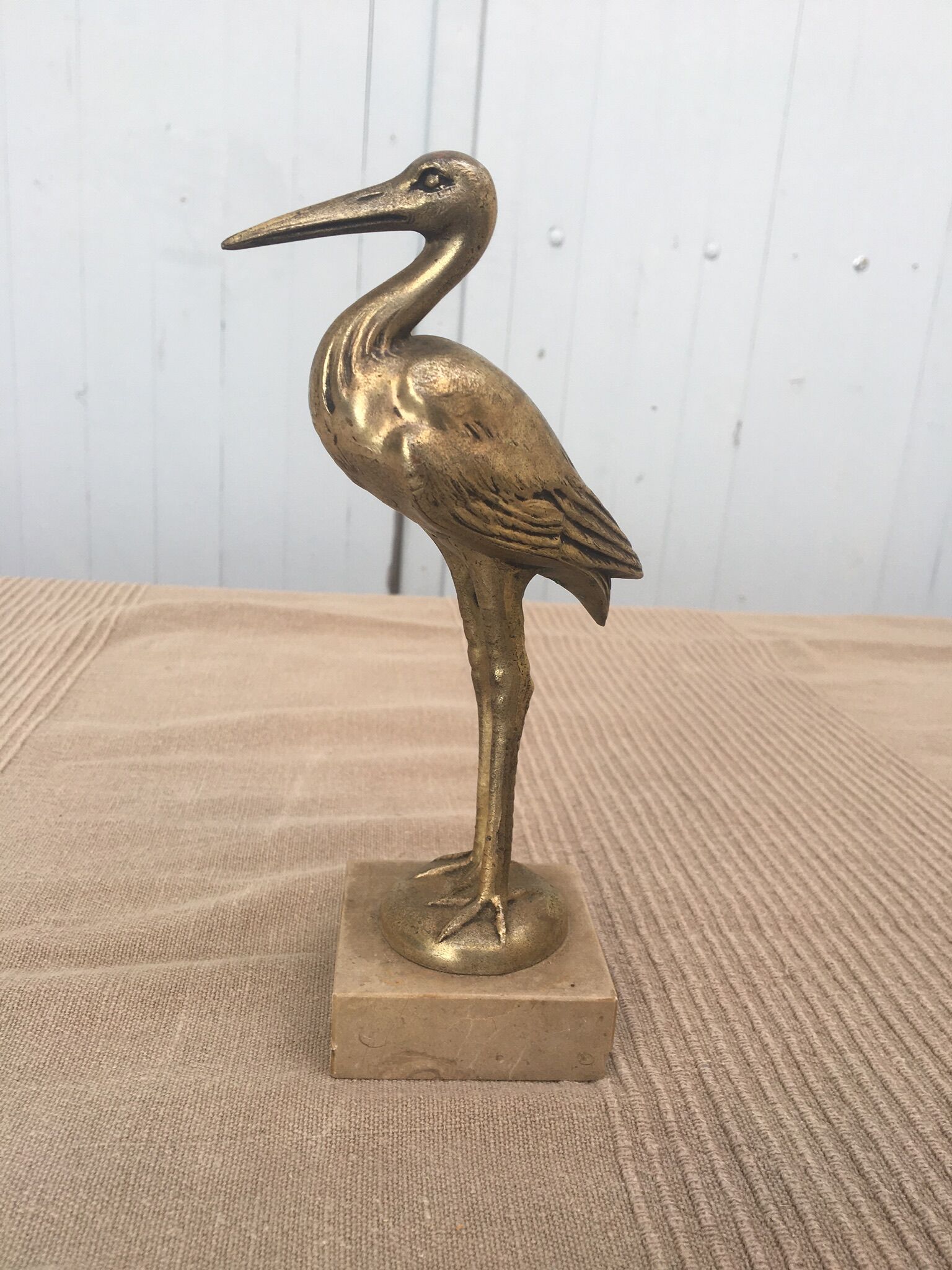 Heron brass statuette
