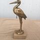 Heron brass statuette