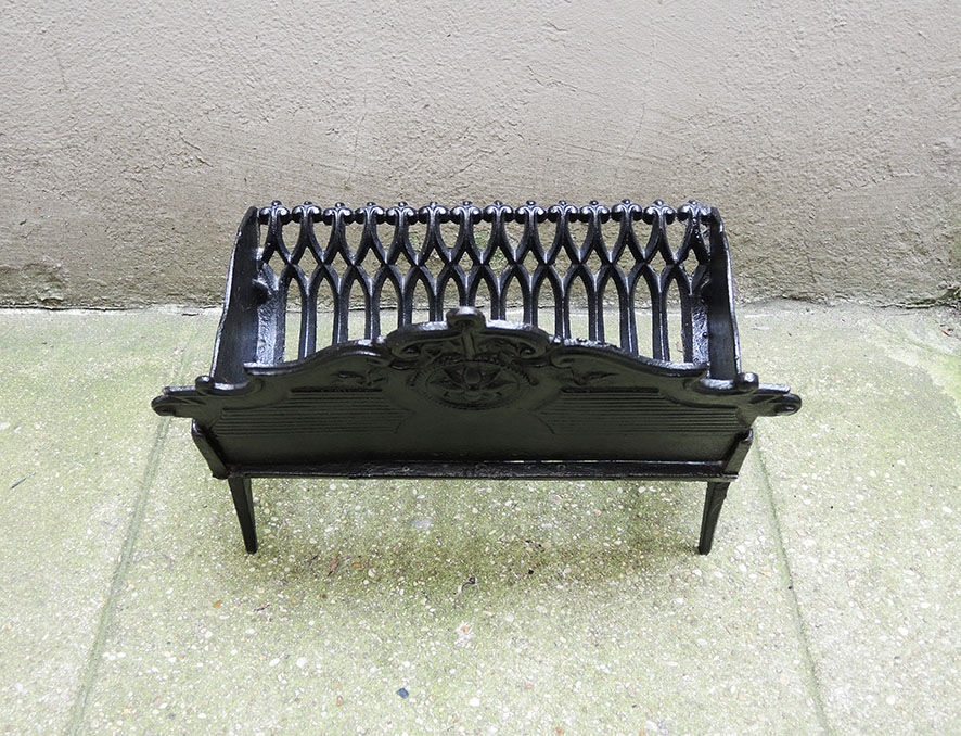 Old gate, cradle with cast iron logs