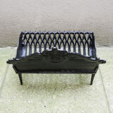 Old gate, cradle with cast iron logs